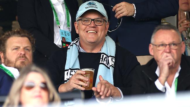 Australian Prime Minister Scott Morrison attending the NRL match between the Cronulla Sharks and Penrith Panthers at Kogarah Oval on Saturday – while taking some time off to during this week’s school holidays. Picture: News Corp