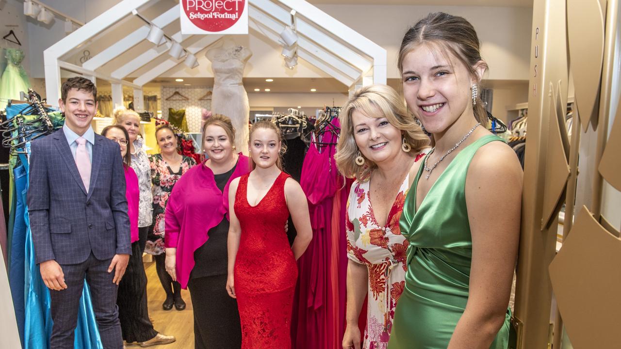 DRESSED TO IMPRESS: (From left) Caiden Bridger, Claire Torkington, Leisa Carney, Leanne Jennings, Kim Stokes, Hannah Clutterbuck, Gay Hold and Charlie Jennings. The Pop-Up Formal store at Grand Central. Picture: Nev Madsen.