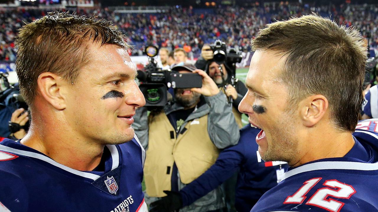 Rob Gronkowski and Tom Brady. (Photo by Adam Glanzman / GETTY IMAGES NORTH AMERICA / AFP)