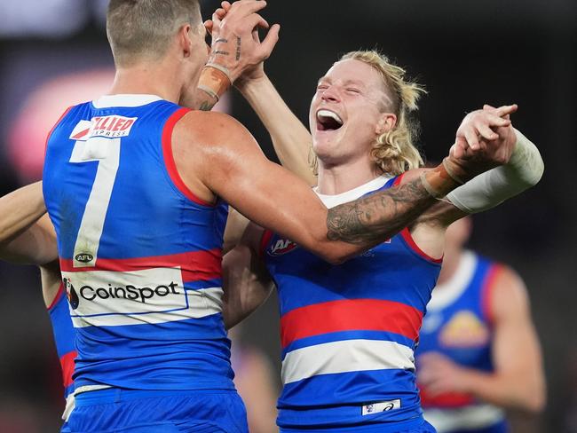 MELBOURNE, AUSTRALIA - JUNE 15: Rory Lobb of the Bulldogs celebrates kicking a goal during the round 14 AFL match between Western Bulldogs and Fremantle Dockers at Marvel Stadium, on June 15, 2024, in Melbourne, Australia. (Photo by Daniel Pockett/Getty Images)