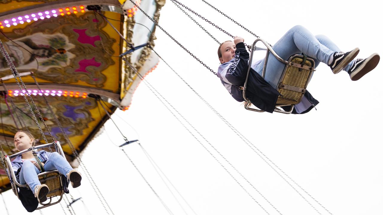 Olivia Sheward (left) and Isabella Horder on a ride at the 2022 Toowoomba Royal Show, Saturday, March 26, 2022. Picture: Kevin Farmer