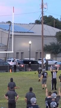 One in a million' footy kick lands inside passing car