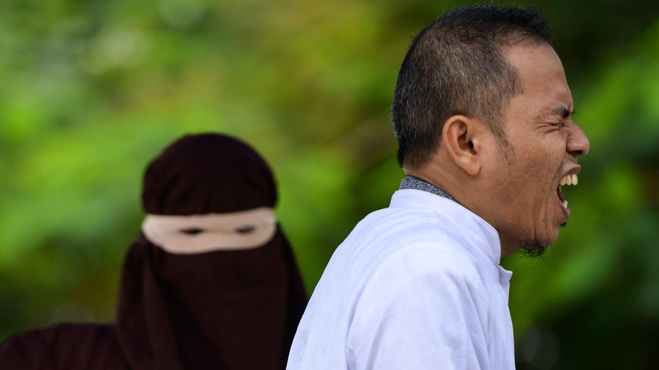 Indonesia Public Flogging: Aceh Whipping Advocate Gets Flogged | News ...