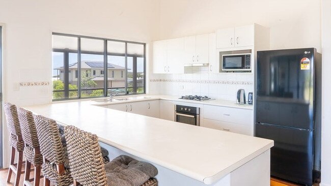 The bright kitchen at 16 Atlantis Boulevard, Agnes Water. Picture: realestate.com.au