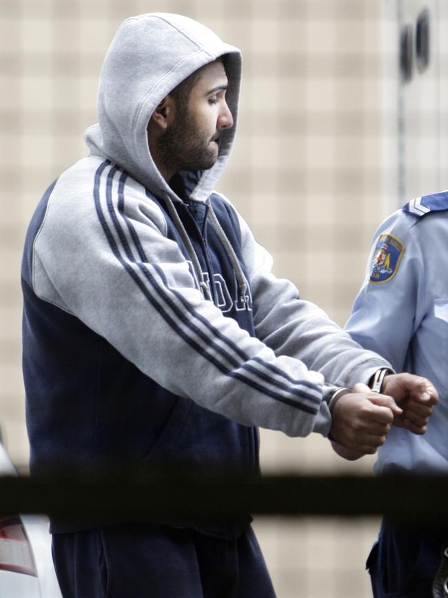 Mohammed Fahda is led into court for a hearing into the shooting death of Abdul Darwiche. File picture