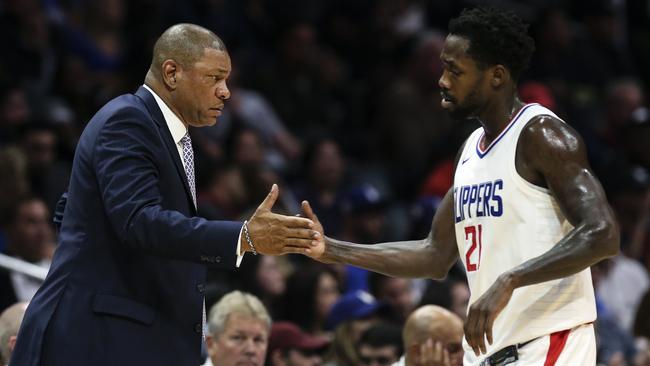 Los Angeles Clippers head coach Doc Rivers with guard Patrick Beverley. Beverley is set to miss the rest of the season. (AP Photo/Ringo H.W. Chiu)