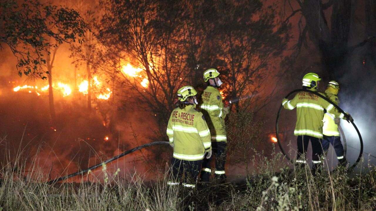 Fire crews defend back burning that destroyed 20 homes