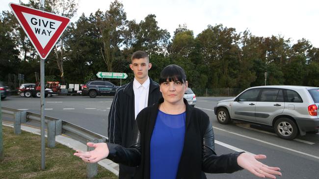 Rebekah Brown, and her son Heath 15, in front of the T Junction of Upper Ormeau Rd and Tillyroen Rd at Ormeau where they were involved in a nasty accident. Picture Glenn Hampson