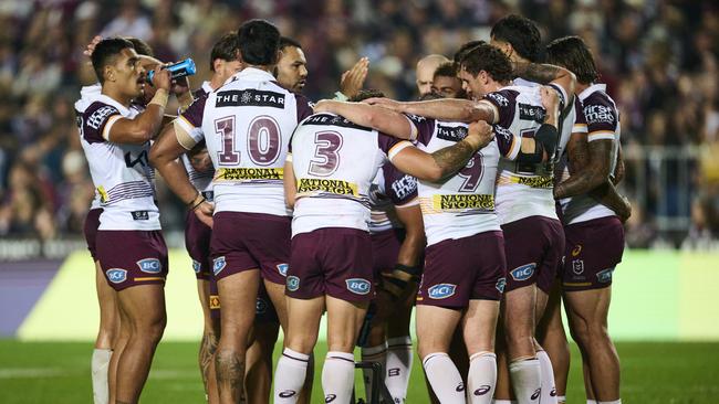 SYDNEY, AUSTRALIA - MAY 31: Broncos players huddle during the round 13 NRL match between Manly Sea Eagles and Brisbane Broncos at 4 Pines Park, on May 31, 2025, in Sydney, Australia. (Photo by Brett Hemmings/Getty Images)