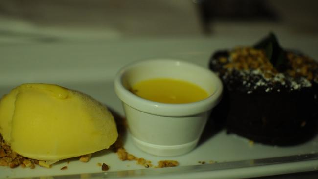 Dark chocolate and hazelnut pudding with mango sorbet.