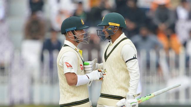 Usman Khawaja and David Warner burst out of the blocks. Picture: AFP