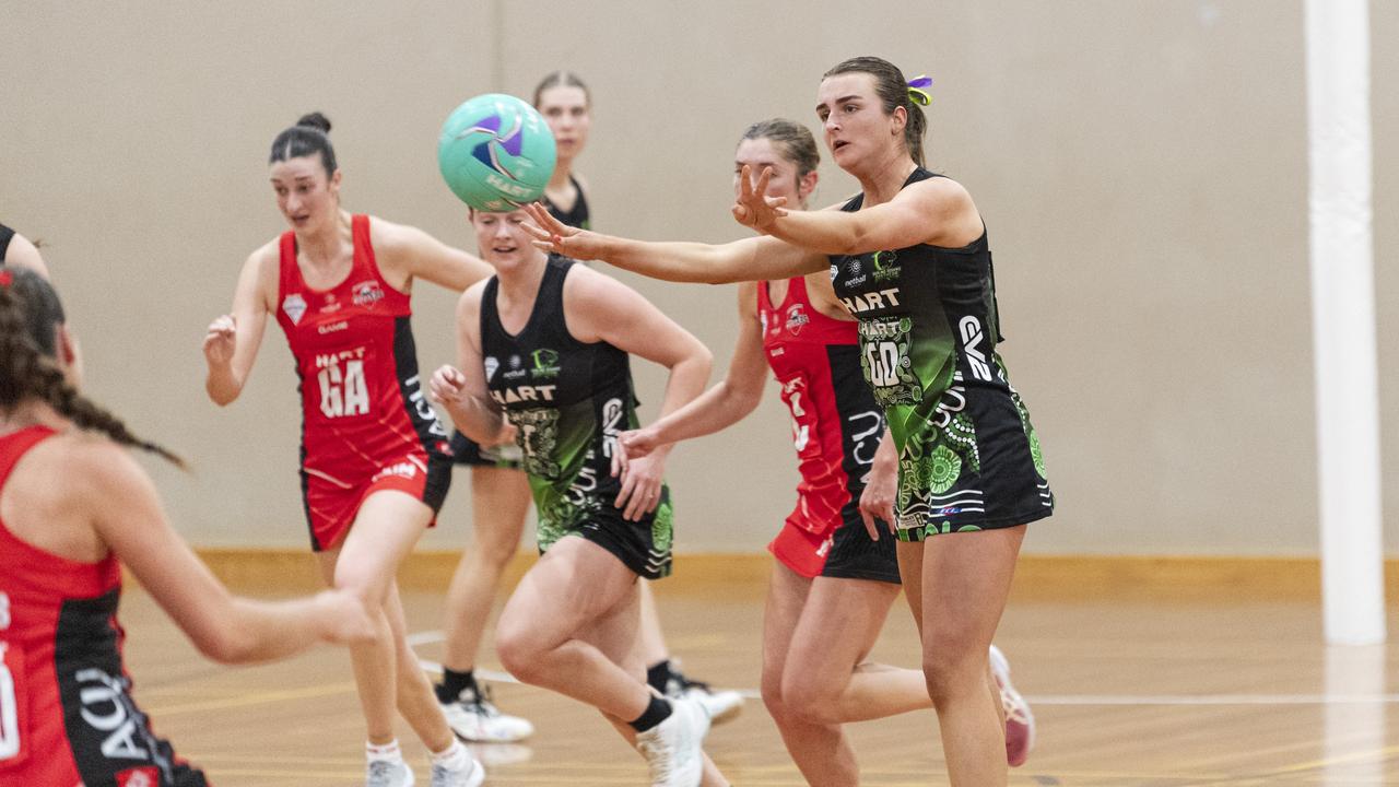 Madeline Smith of Darling Downs Panthers fires off a pass during her side’s Hart Sapphire Series Ruby division match against ACU Brisbane North Cougars. Picture: Kevin Farmer