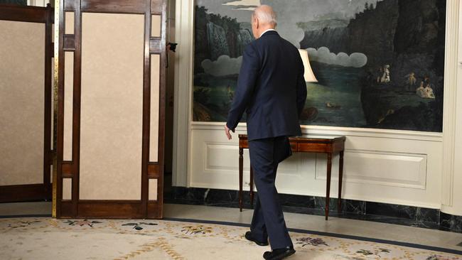 Mr Biden departs after his press conference. Picture: AFP