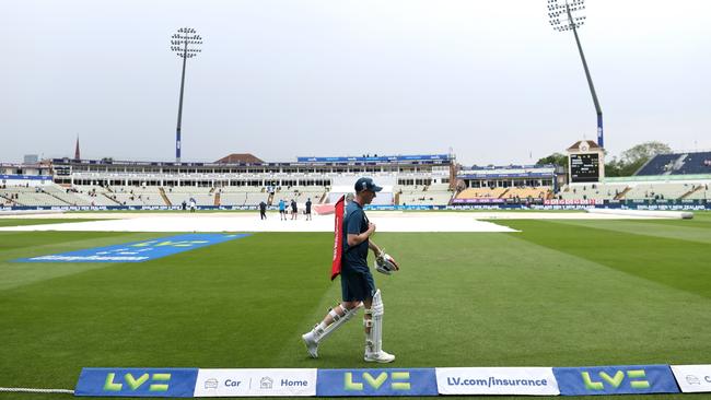 England’s Harry Brook walks under gloomy skies early on day two of the first Ashes Test. Picture: Getty