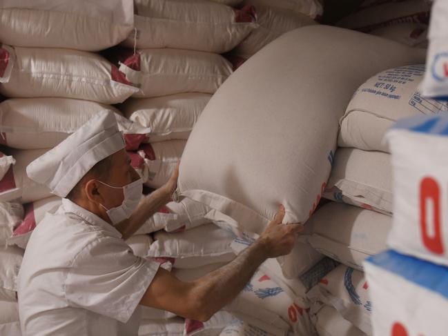 LULEBURGAZ, TURKEY - MARCH 22: An employee carries a bag of flour in a storage of a bakery on March 23, 2022 in Istanbul, Turkey. In 2021 Turkey's wheat imports from Ukraine and Russia reached record levels. The Russian invasion of Ukraine is causing shortages of wheat worldwide and bread prices are rising in many countries. Russia is the world's number-one wheat exporter and largest producer, after China and India, but international sanctions are preventing sales and disrupting the supply chain. Ukraine is among the top five wheat exporters worldwide but war with Russia is preventing the wheat from leaving the country via its Black Sea ports. (Photo by Burak Kara/Getty Images)