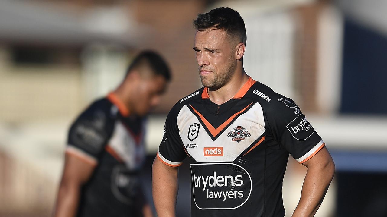 ROCKHAMPTON, AUSTRALIA - AUGUST 21: Luke Brooks of the Tigers looks dejected after losing the round 23 NRL match between the Wests Tigers and the Cronulla Sharks at Browne Park, on August 21, 2021, in Rockhampton, Australia. (Photo by Ian Hitchcock/Getty Images)