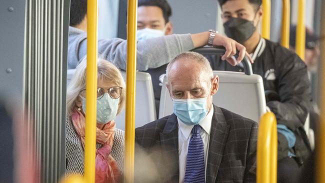 Paul Dawson, twin brother of Chris Dawson, appears to be in deep thought while travelling on a tram after his brother was found guilty of murdering Lynette Dawson. Picture: Liam Mendes