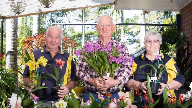 Caboolture Orchid Society members Ian Blanch, Jim Endres and June Blaschek. Picture: Dominika Lis