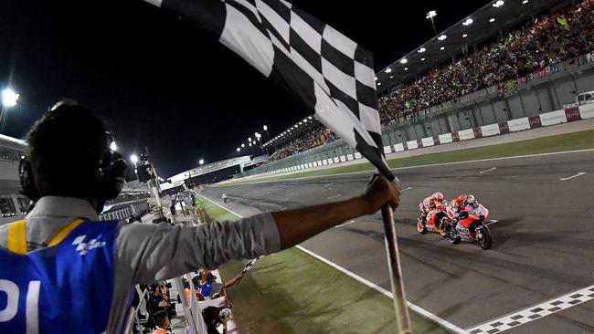 Andrea Dovizioso beats Marc Marquez to the win in Qatar. Pic: MotoGP.com