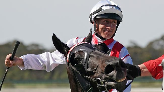 William Pike celebrates after riding Top Of The Range to victory in the Bendigo Cup.