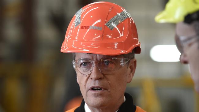 Federal Opposition Leader Bill Shorten tours the One steel factory in Adelaide, Wednesday Sept., 21, 2016. Shorten is pressuring the federal government to match Labor's $100 million pledge to struggling steelmaker Arrium. (AAP Image/David Mariuz) NO ARCHIVING