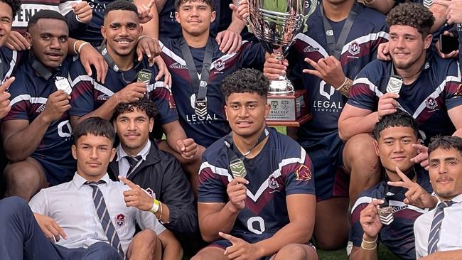 Ipswich SHS celebrate another win, including big man Ahmani Leilua, middle.