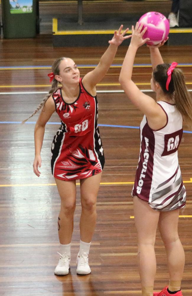 Shalom College's (Bundaberg) Macey Egan in action (left). Photo: David Bond.