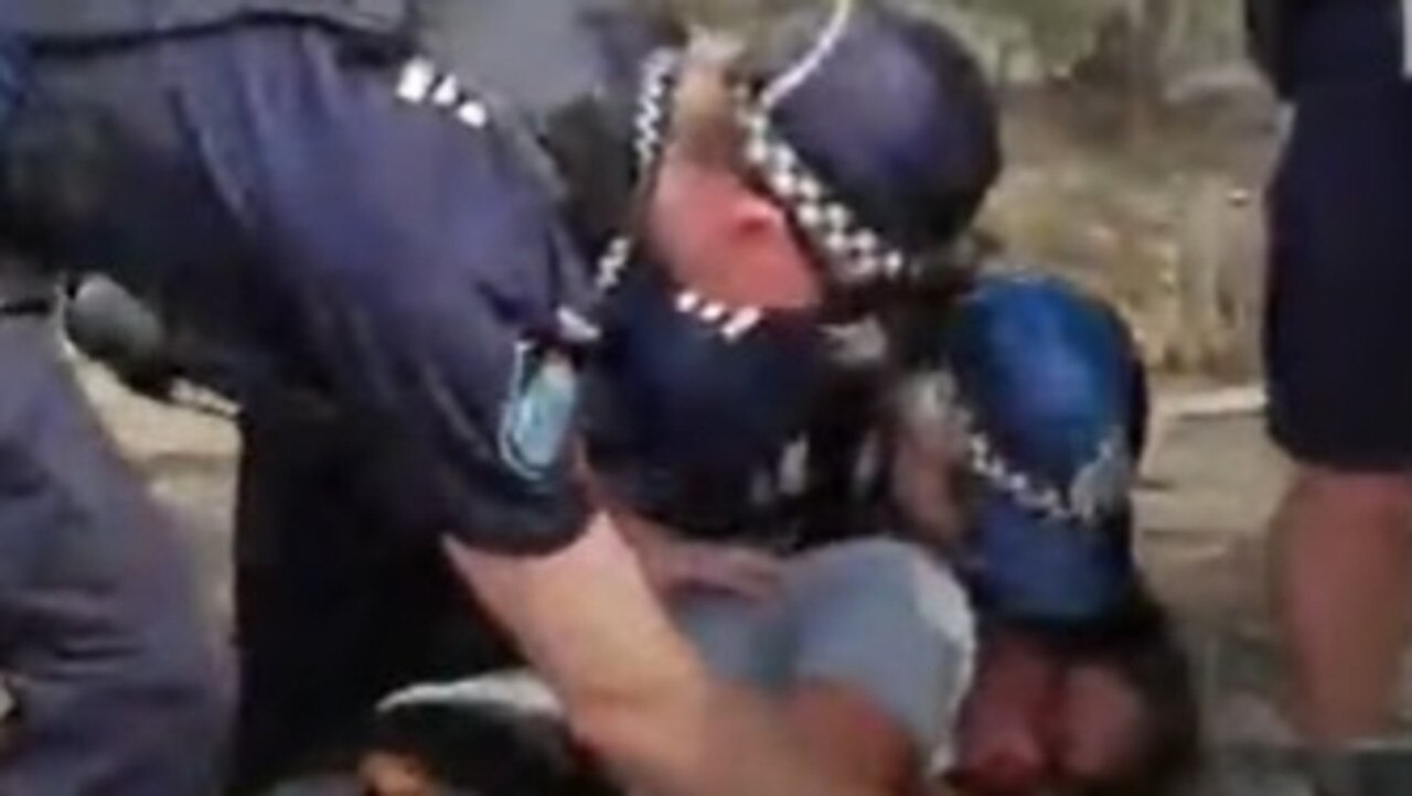 Police take action against protesters at the "Gympie Pyramid" site on Saturday October 30, 2021.