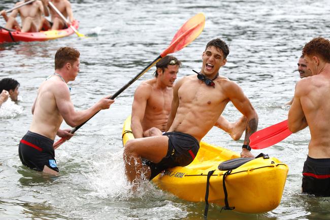 Gold Coast Suns players (from left) Matt Rowell, David Swallow, Sean Lemmens and Matt Conroy at Palm Beach. Picture: Tertius Pickard