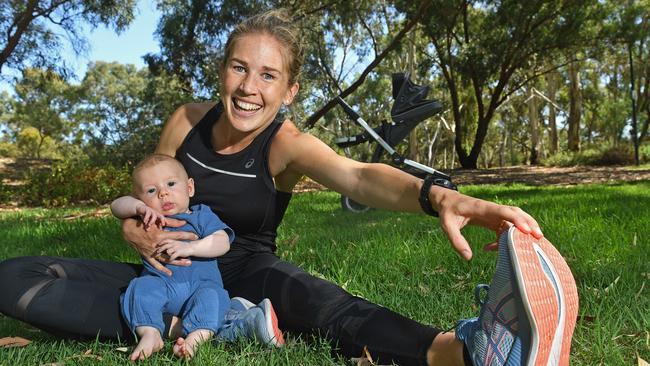 Marathon runner Jess Stenson (nee Trengove) with son Billy earlier this year. Stenson will not be able to qualify for this year’s Olympics after lead-up races were cancelled due to the coronavirus pandemic. Picture: Tom Huntley