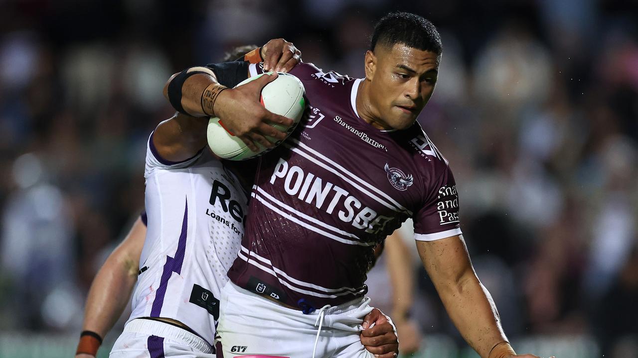 SYDNEY, AUSTRALIA - APRIL 14: Haumole Olakau'atu of the Sea Eagles is tackled during the round seven NRL match between the Manly Sea Eagles and Melbourne Storm at 4 Pines Park on April 14, 2023 in Sydney, Australia. (Photo by Cameron Spencer/Getty Images)