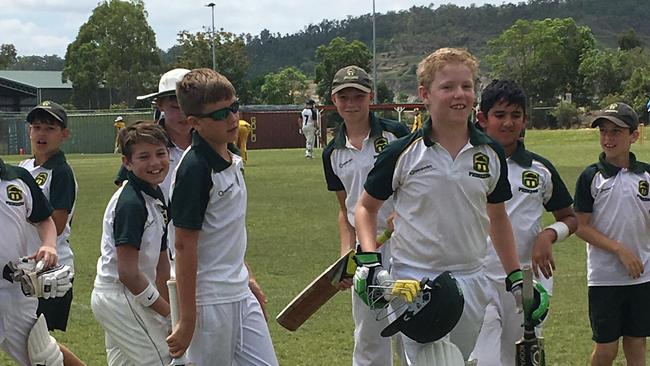 Isaac Olver leaving the field after hitting 50.