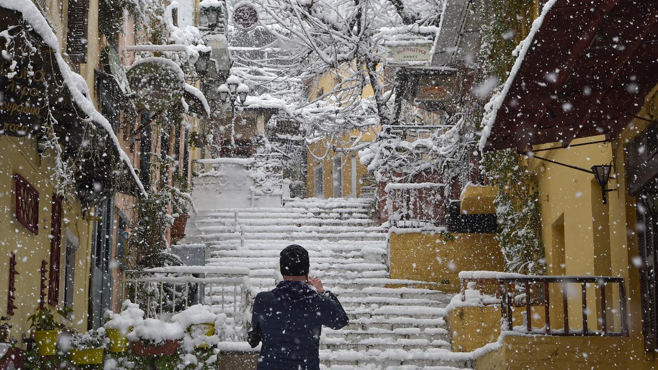 The popular tourist area of Plaka in Athens during a heavy snowfall. Picture: Milos Bicanski/Getty Images