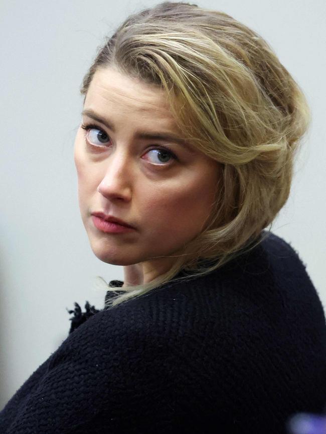 Amber Heard during the $50 million court stoush. (Photo by Michael REYNOLDS / POOL / AFP)