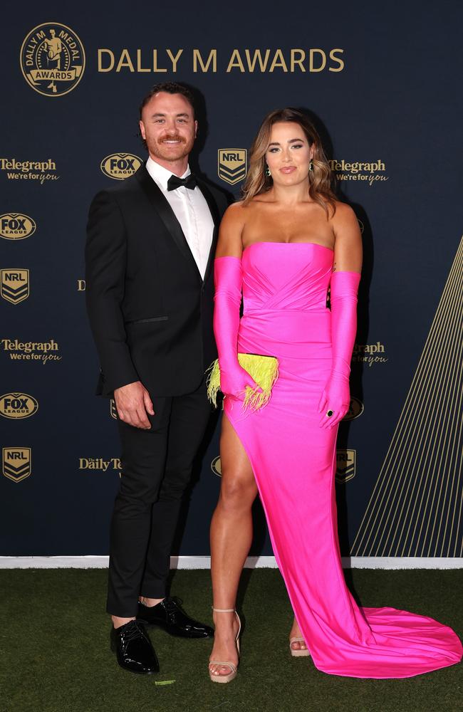 Rooster’s captain Isabelle Kelly shone in a vivid pink frock donned with matching gloves alongside husband Jake. (Photo by Mark Kolbe/Getty Images)