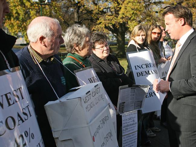 Rosebery community members protesting about the planned closure of the Rosebery Hospital outside of Parliament House, Opposition leader Will Hodgman talks to the residents