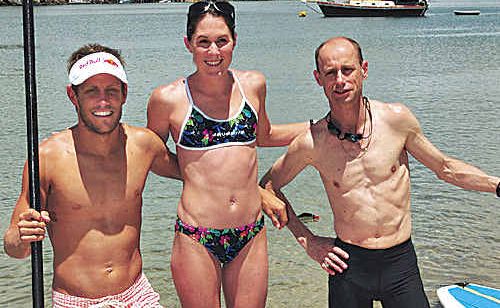 Triathletes Courtney Atkinson and Annabel Luxford rub shoulders with Steve Moneghetti, right. Picture: Geoff Potternb