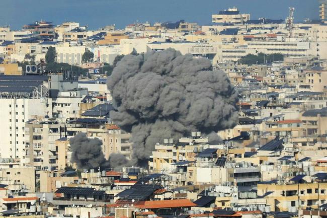 Smoke rises from the site of an Israeli air strike that targeted the Haret Hreik area of Beirut's southern suburbs