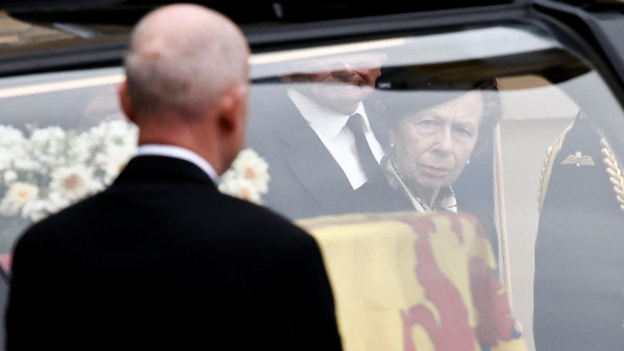 Princess Anne watches as the hearse carrying the coffin of her mother, after it arrives at the Holyrood Palace. Picture: Alkis Konstantinidis/ WPA Pool/ Getty Images