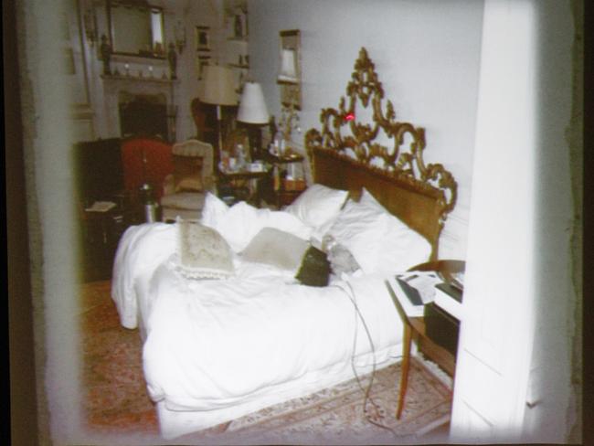 A slide of the bed where Michael Jackson died is shown during the prosecution's opening arguments in the Conrad Murray involuntary manslaughter trial.