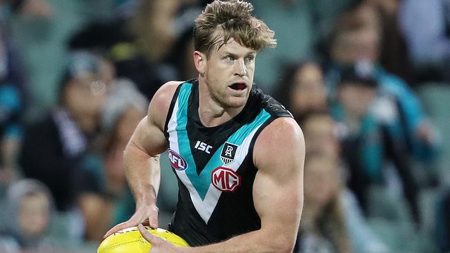 Don’t expect Power hard man Tom Jonas and the rest of the Port defence to take a backward step against Richmond big forward Tom Lynch. Picture: Sarah Reed