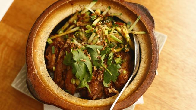 Tassie Living - Five of the best Clay pot meals - MYU Easybites, New Town.  One of their signature dishes at this tiny Malay-Chinese restaurant is grilled Shandong claypot chicken cooked in a homemade sauce, served with fragrant short grain rice, fresh sliced cucumber and coriander ($19). Picture: MATT THOMPSON