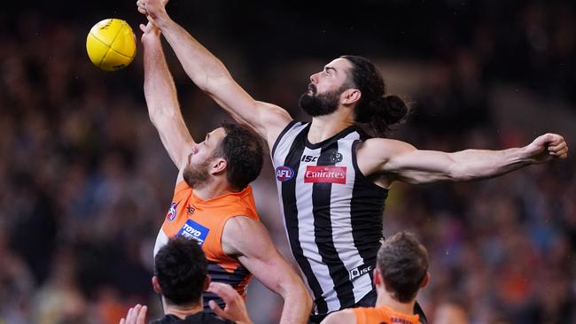 Shane Mumford beats Brodie Grundy in a ruck contest. Picture: AAP