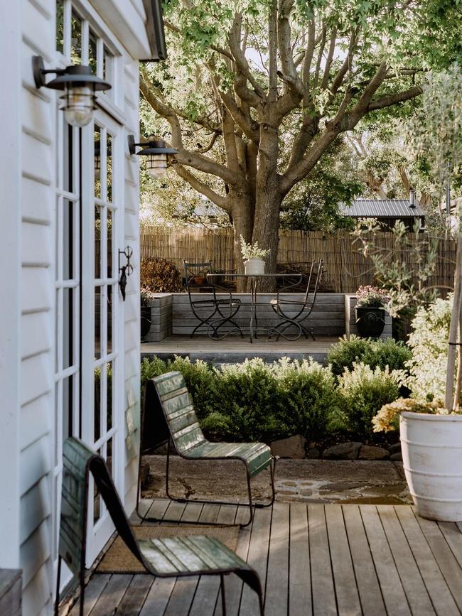 The property’s loft and leafy garden. Picture: Madeleine Becker