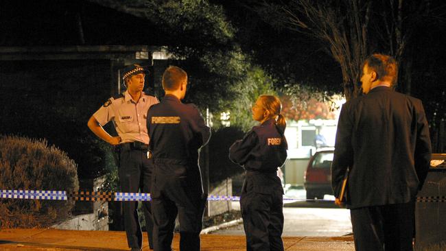 Police at the Hodson home in Kew after the discovery of their bodies. Picture: Darren McNamara 