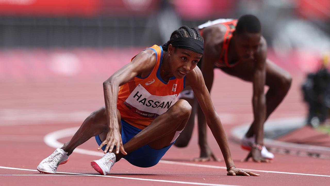 Dutch runner Sifan Hassan picks herself up after falling over Kenyan Edinah Jebitok in a heat of the women’s 1500m at the Tokyo Olympic Stadium. Picture: Getty Images