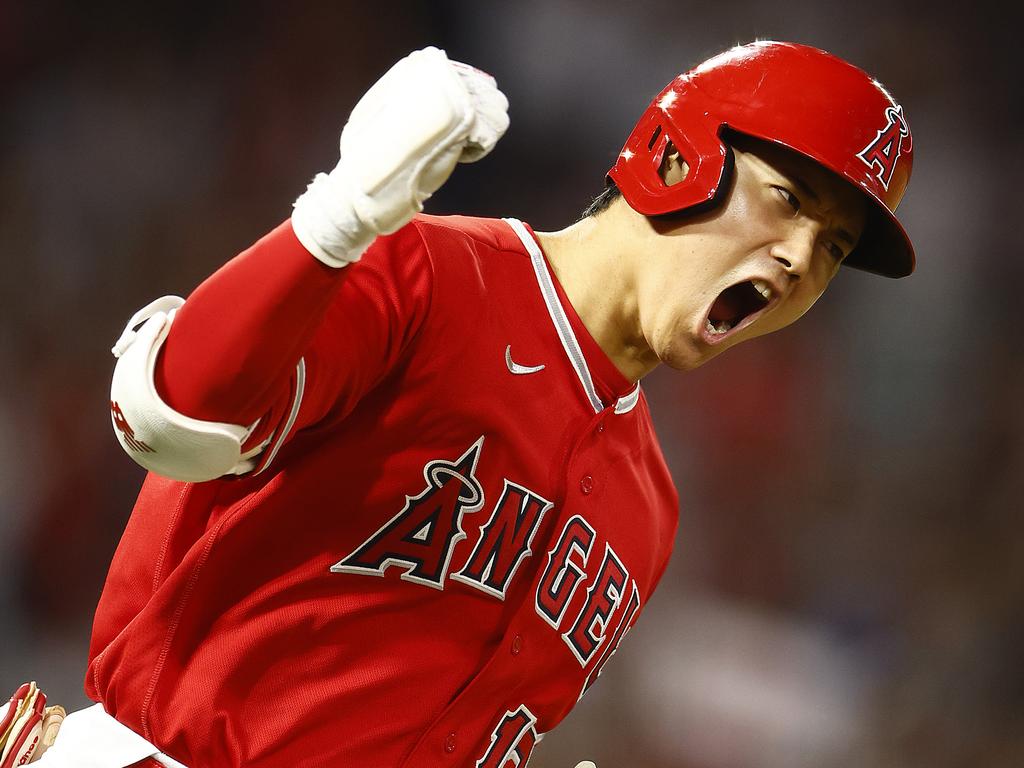 ANAHEIM, CALIFORNIA - JULY 17: Shohei Ohtani #17 of the Los Angeles Angels reacts after hitting a two-run home run against the New York Yankees in the seventh inning at Angel Stadium of Anaheim on July 17, 2023 in Anaheim, California. (Photo by Ronald Martinez/Getty Images)