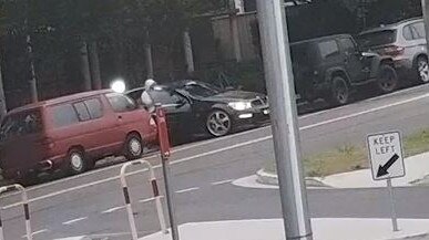 CCTV of two men in a distinctive Commodore around the time of the Bexley shooting. Source NSW Police