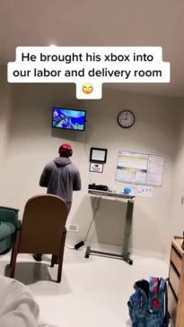 Dad takes Xbox to hospital for entertainment while his partner gives birth.