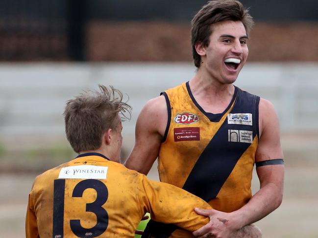 Will Jury is all smiles after nailing a goal for Strathmore. Picture: Mark Dadswell